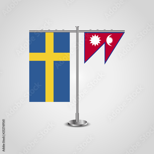 Table stand with flags of Sweden and Nepal.Two flag. Flag pole. Symbolizing the cooperation between the two countries. Table flags