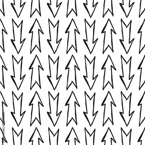 Fototapeta Naklejka Na Ścianę i Meble -  Seamless pattern with black hand drawn arrows