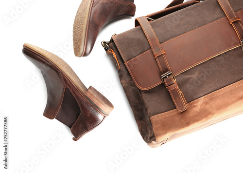Male shoes and bag on white background