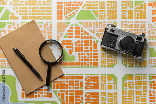 Photo camera, notebook and ...