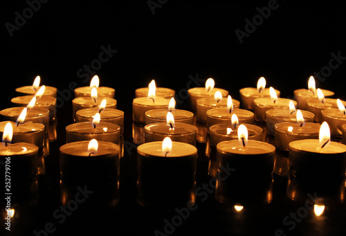 Many burning candles with copy space area