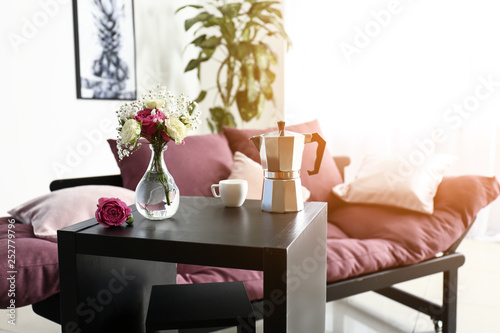 Coffee pot with cup and bou...