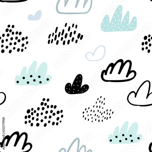 Seamless pattern with doodle clouds. Perfect for kids fabric, textile, nursery wallpaper. Vector Illustration.