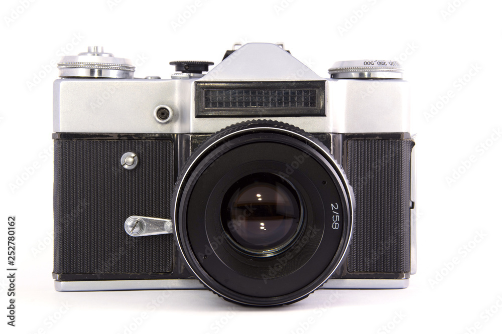 old film mirror full-frame photo camera with lens on white background. isolated. old film mirror full-frame photo camera with lens on white background. isolated.