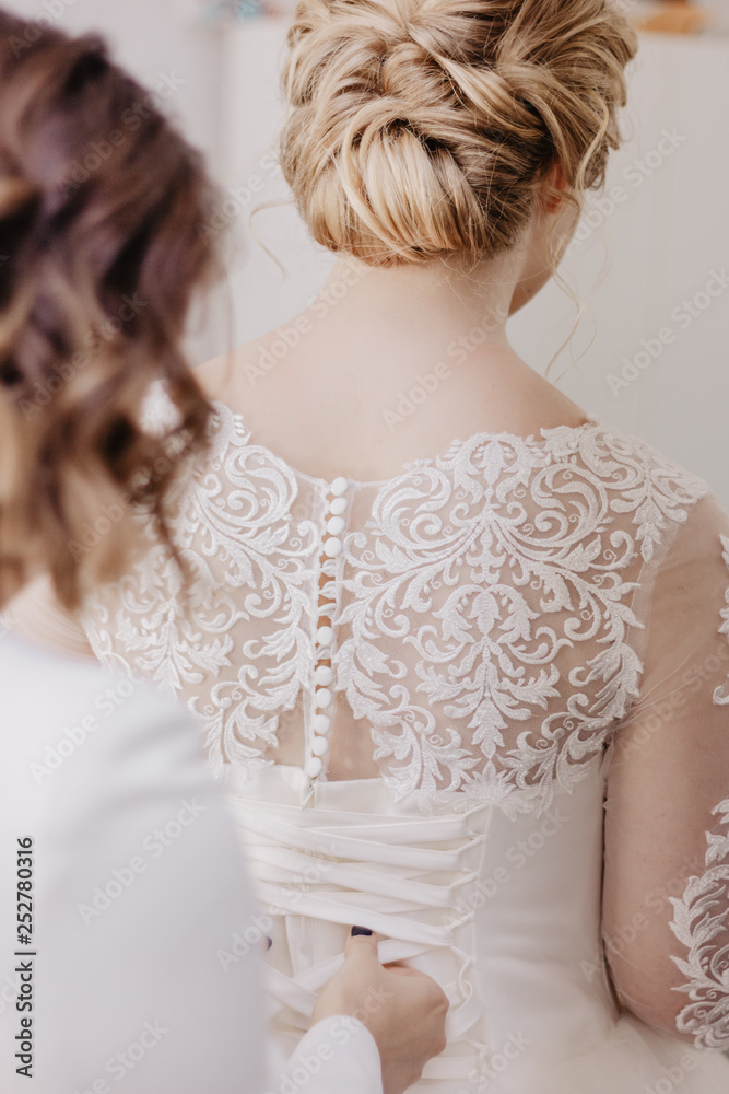 the bride wears a dress