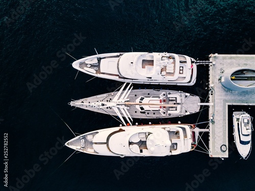 Aerial view from above at the luxury yachts in the marina © nblxer