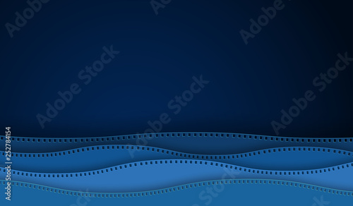 Wave cinema film strip paper cut isolated on blue background. 35 mm camera diapositive for design layout cinema poster, banner, flyer, brochure, cover. Closeup view cinema with space for your text
