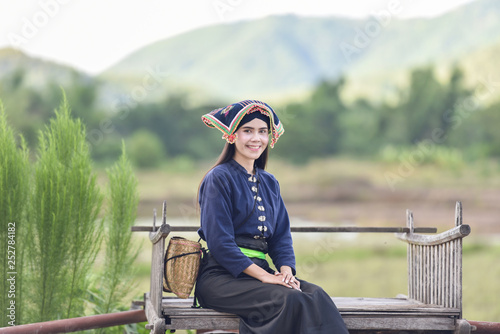 Asia woman thai style dress tribe Tai Dam / Portrait of beautiful young girl smiling Thailand traditional costume