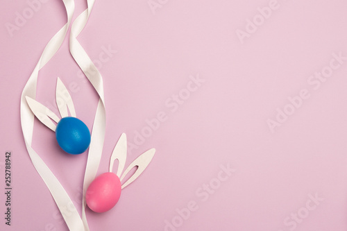 easter eggs on pink background