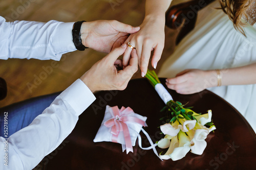 man and woman hands. love and cup coffee concept photo