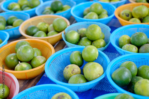 Fototapeta Naklejka Na Ścianę i Meble -  Thai Lime Fruit green Lemon Closeup Photo