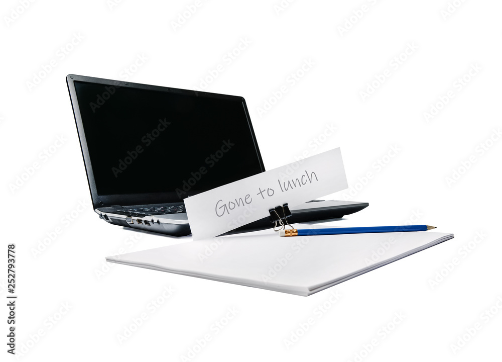 A notebook, a pack of paper, a pencil and an ad on a stationery clothespin. The theme of the office and work. Side view. A notebook, a pack of paper, a pencil and an ad on a stationery clothespin. The theme of the office and work. Side view.