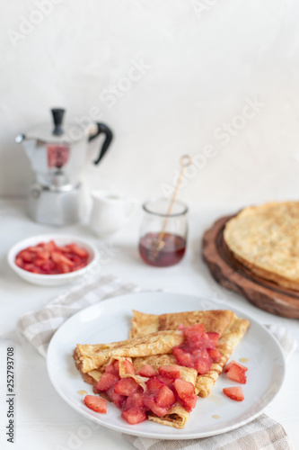 Shrovetide maslenitsa festival meal, rustic style, wooden background - traditional russian blini