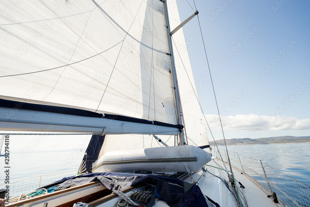 Portrait of sailing boat on open sea