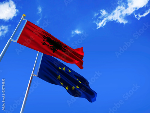 Albania flag EU flag Silk waving flags Republic of Albania with black eagle emblem on red and European Union with a flagpole on a sunny blue sky background with white clouds 3D illustration