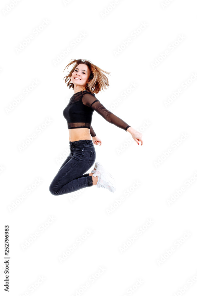 Sport woman jumping isolated on white background.