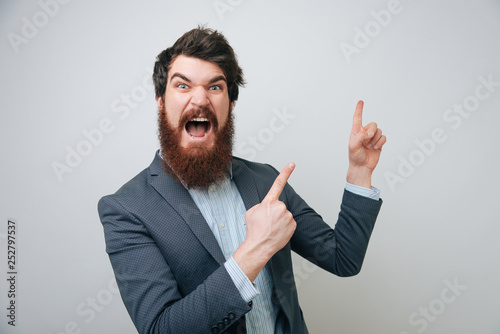 Image of Excited bearded bu...