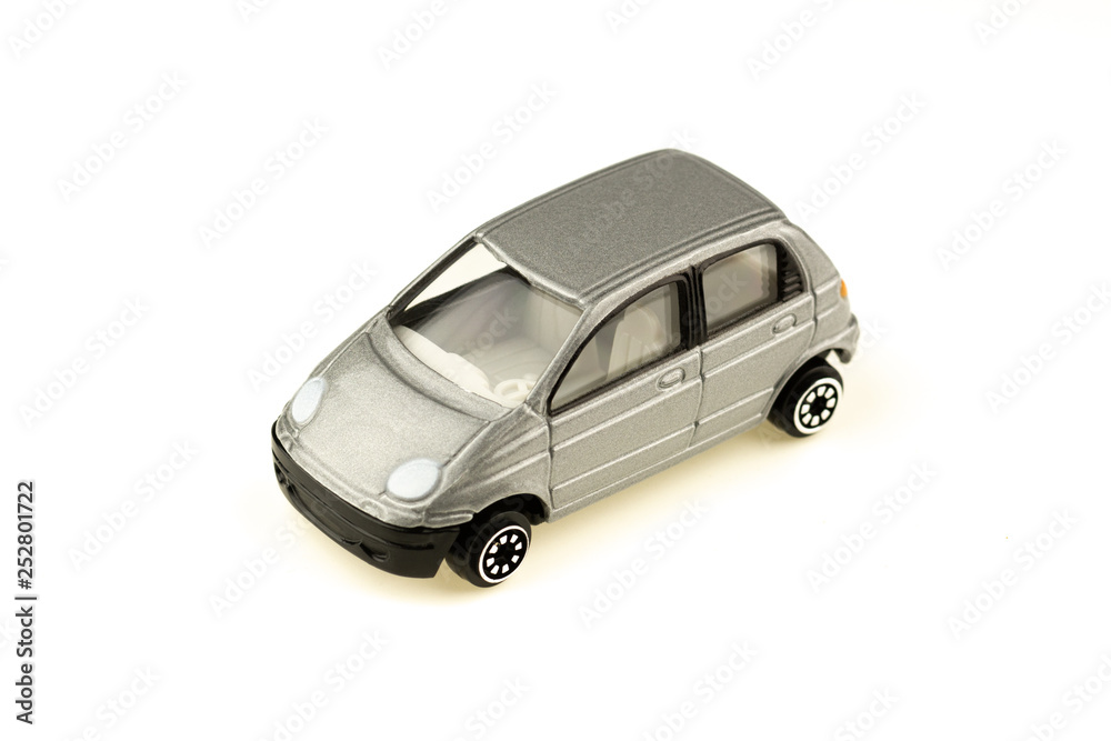 Grey miniature car model isolated on white background. Grey miniature car model isolated on white background.