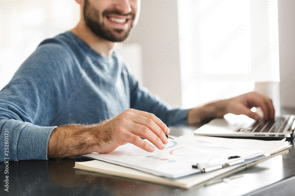 Cropped image of a handsome man freelancer Cropped image of a handsome man freelancer