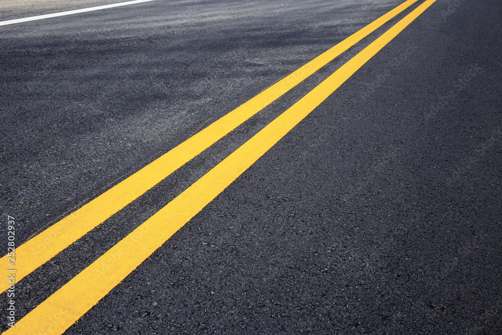 Traffic line of yellow on street.