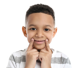 Little boy training pronounce letters on white background