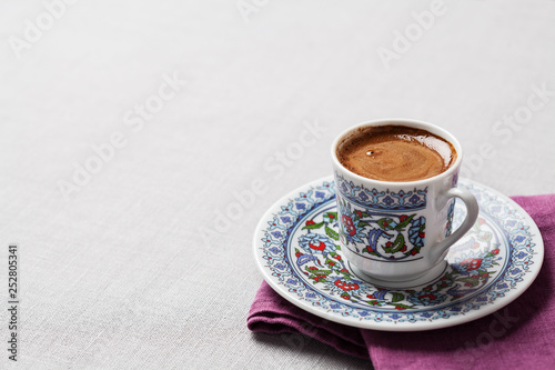 Black coffee in traditional Turkish cup