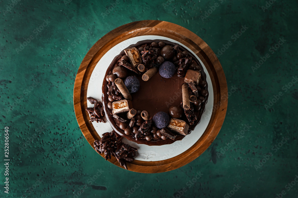 Tasty chocolate cake on table