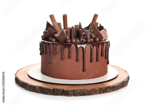 Tasty chocolate cake on white background photo