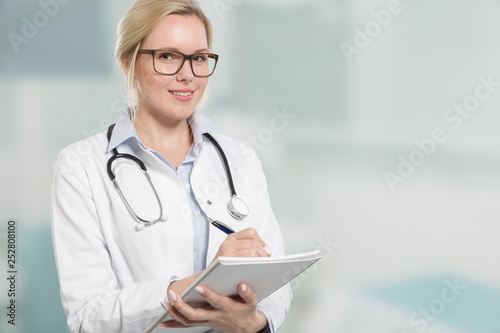 friendly female family doctor with stethoscope