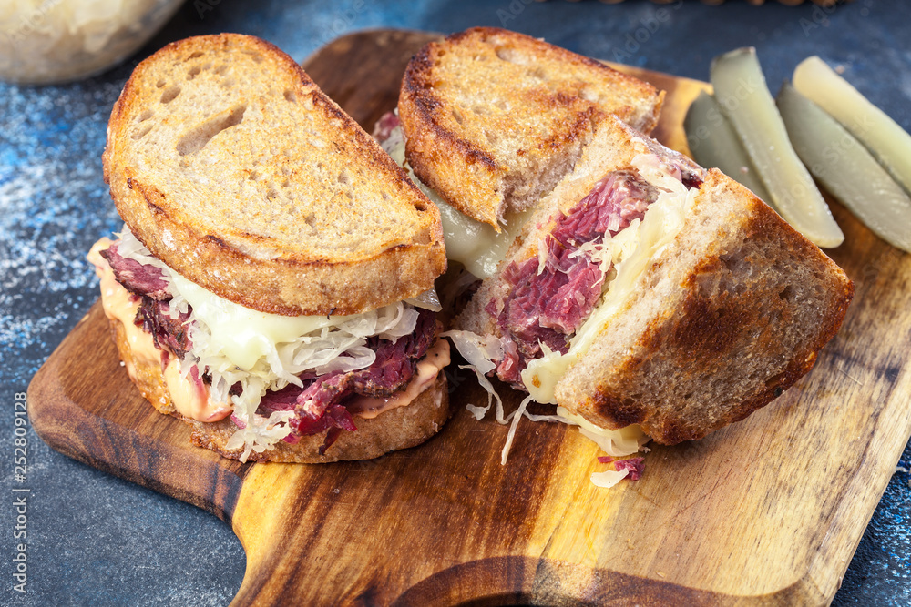 Reuben Sandwich with corned beef, cheese and sauerkraut Reuben Sandwich with corned beef, cheese and sauerkraut