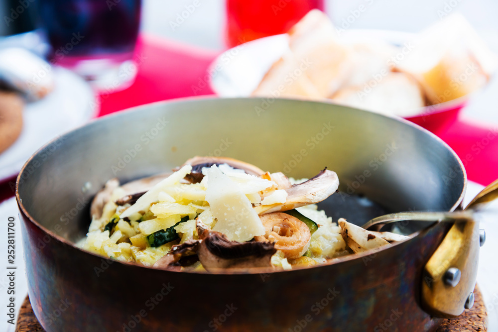 risotto with fresh cream, salted chicken, rehydrated ceps and mushrooms