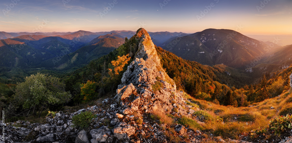 Plakat Mountain autumn panorama at sunset with forest and rocks.