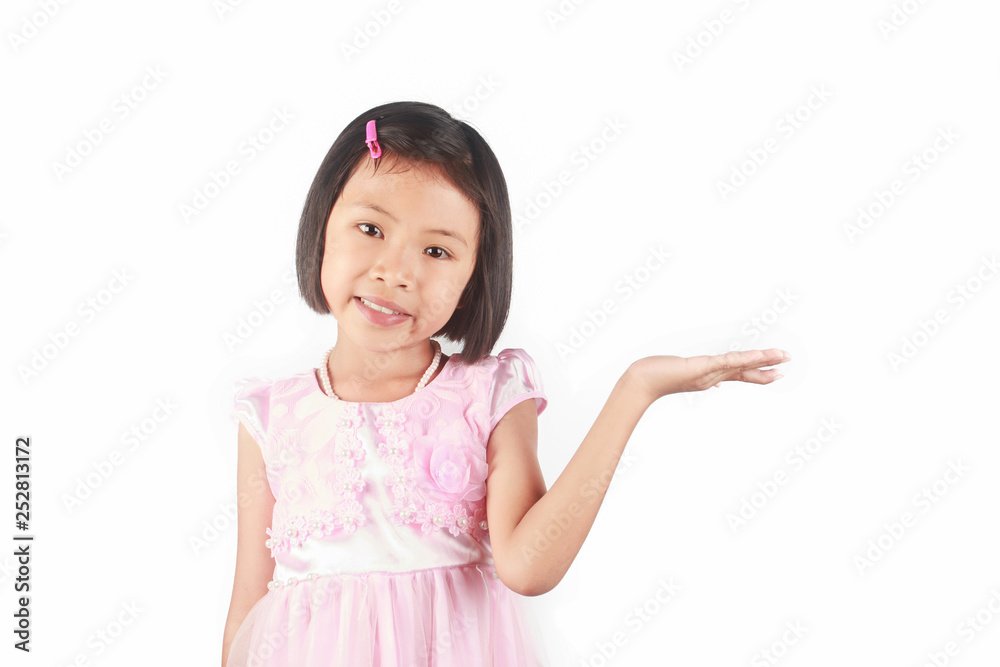 Cute little asian girl presenting your product on white background Cute little asian girl presenting your product on white background