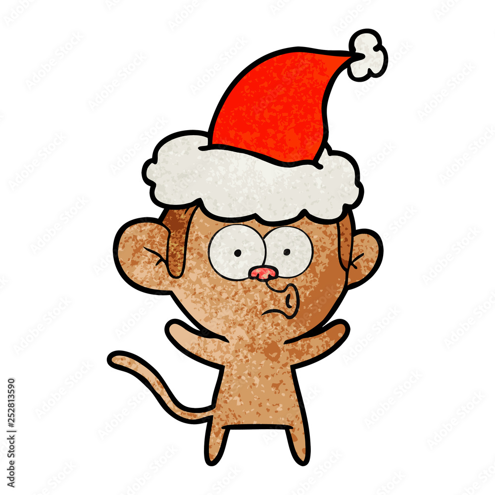 textured cartoon of a surprised monkey wearing santa hat textured cartoon of a surprised monkey wearing santa hat