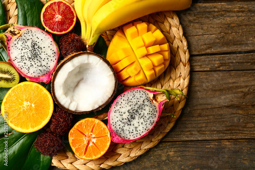 Fototapeta Naklejka Na Ścianę i Meble -  Assortment of exotic fruits on wooden table