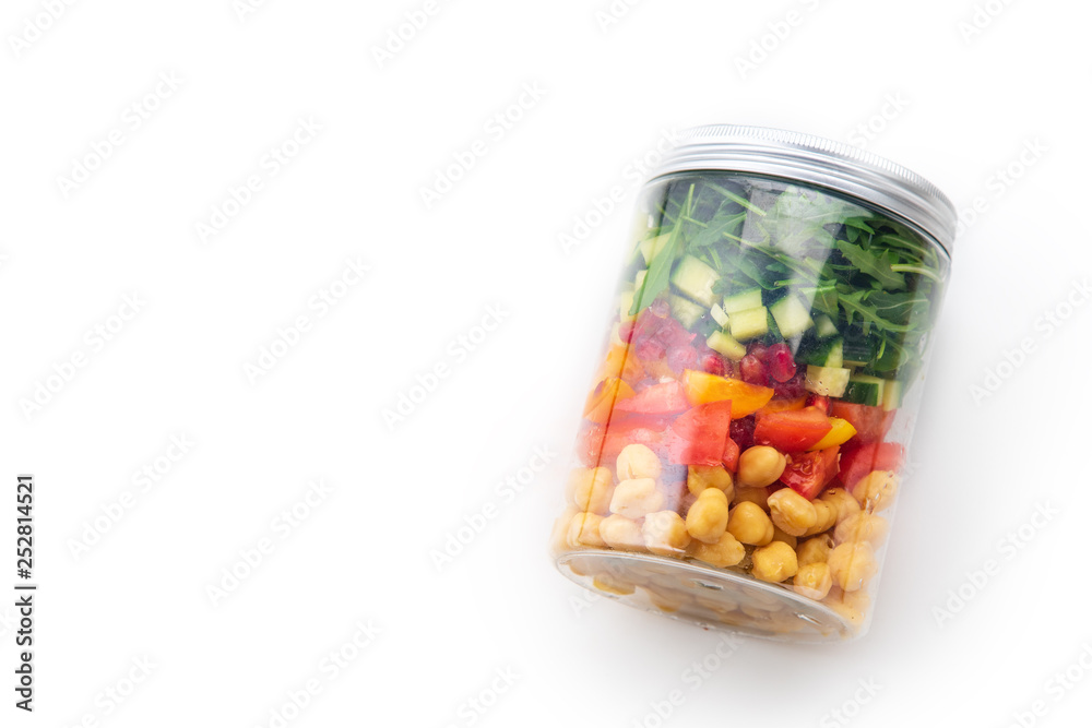 Healthy salad with chickpeas and arugula in a jar on white background. Take away easy lunch concept Healthy salad with chickpeas and arugula in a jar on white background. Take away easy lunch concept