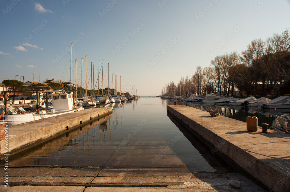 Dock in the Villaggio del Pescatore, Italy