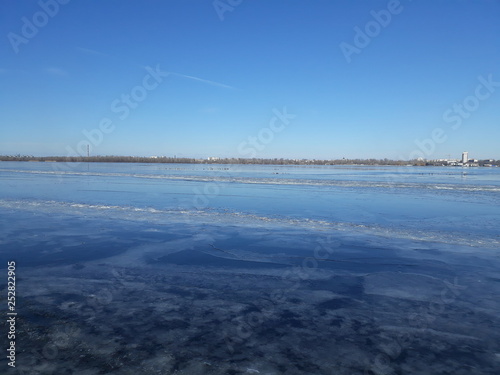 Wide frozen river Dnieper.