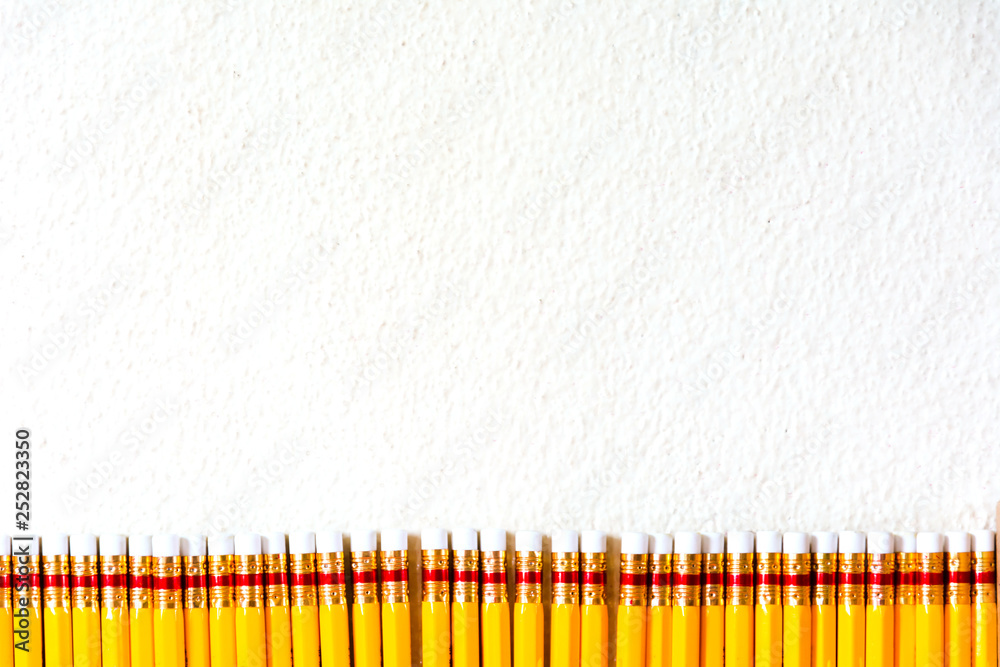 Yellow pencil in line background on with background Yellow pencil in line background on with background