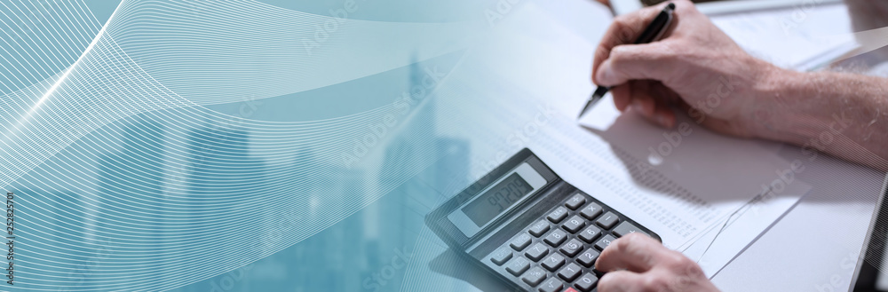 Hand using calculator, accounting concept. panoramic banner - obrazy, fototapety, plakaty 