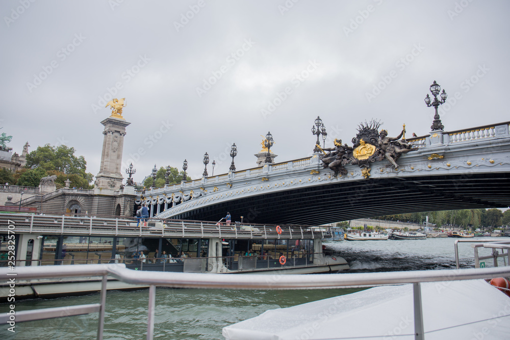 boats on the pier near the river Seine in paris