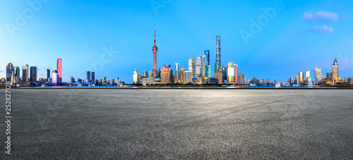 Empty asphalt square ground with panoramic city skyline in Shanghai,China