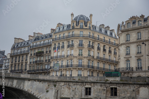 historic buildings in paris on the river seine