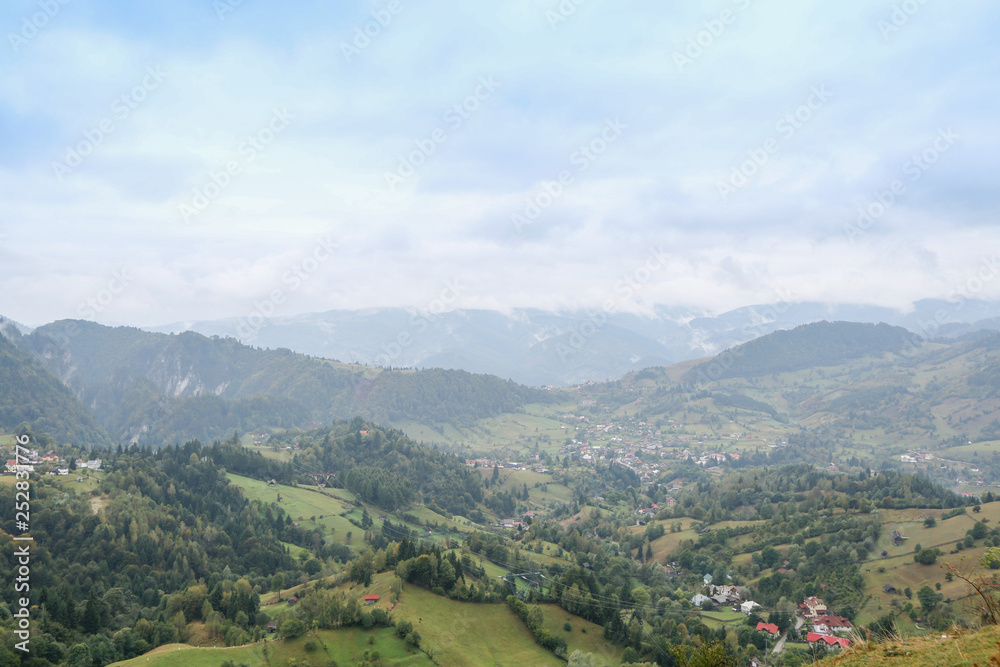Panoramic view of a valley at countryside Panoramic view of a valley at countryside