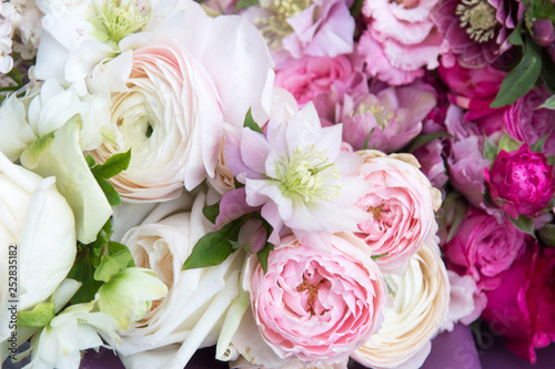  Floral background, texture. Beautiful rich elegant wedding bouquet, flowers arrangement by florist with white and pink roses close up, macro 