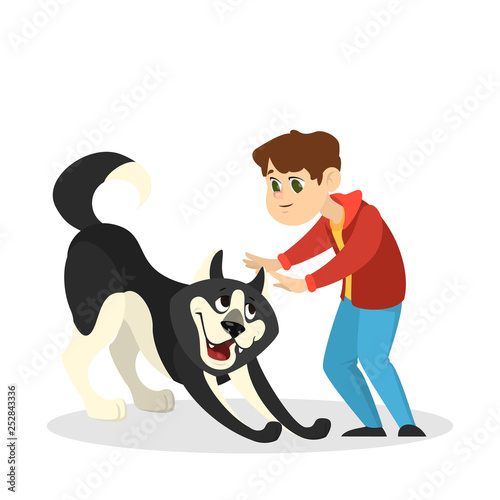 Child boy play with a dog. Happy kid