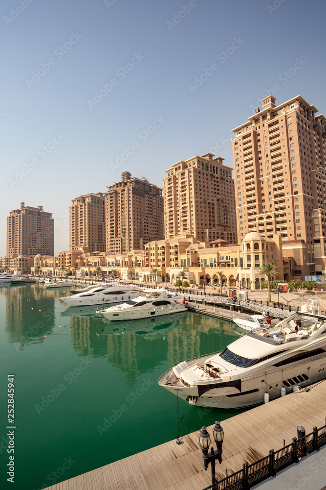 DOHA, QATAR – SEPTEMBER 06 2013: Mediterranean-style towers in The Pearl Qatar