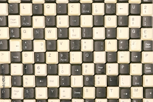 set of keys from old computer keyboards laid out on the table