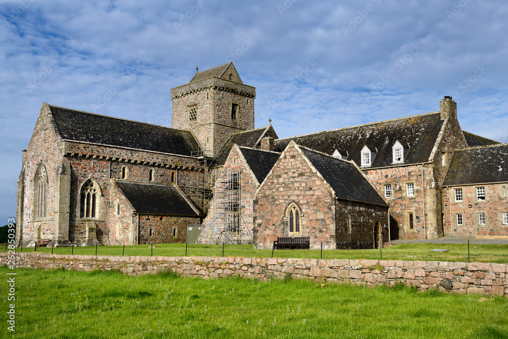 Restoration work of medieval church and monastery of Iona Abbey founded by St Columba on Isle of Iona Inner Hebrides Scotland UK