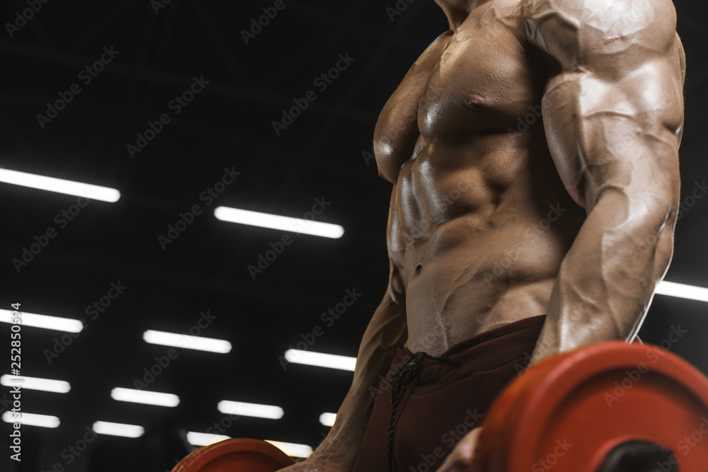 Handsome strong athletic men pumping up muscles workout barbell curl bodybuilding concept background Handsome strong athletic men pumping up muscles workout barbell curl bodybuilding concept background